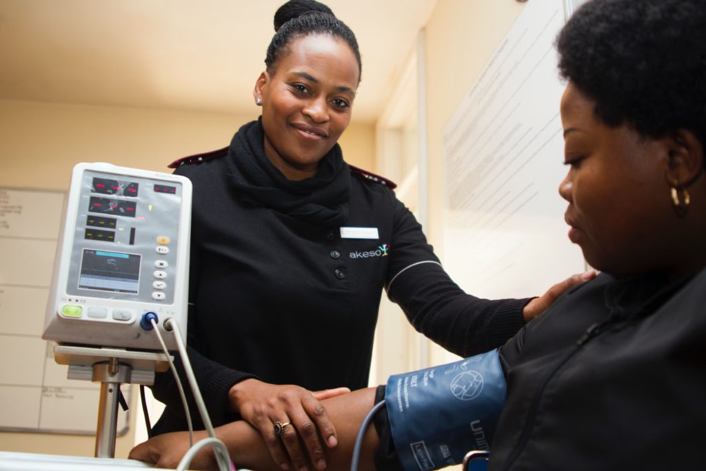 woman in blood pressure cuff