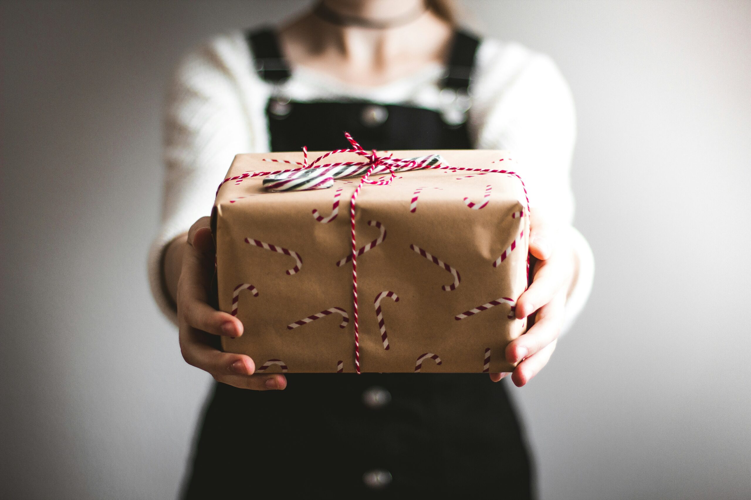 Woman holding holiday gift